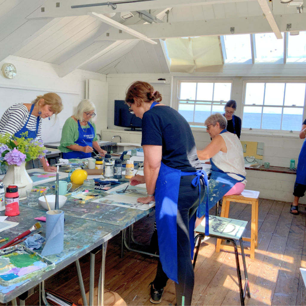 students painting on an summer art workshop