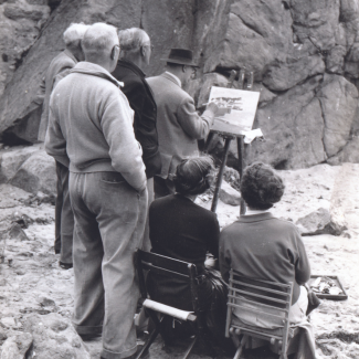 Historic imagery of students on the beach 