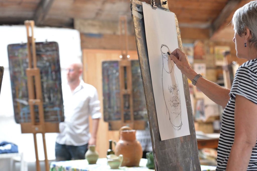 still life with tutor Ashley Hold using easels in historic art studio